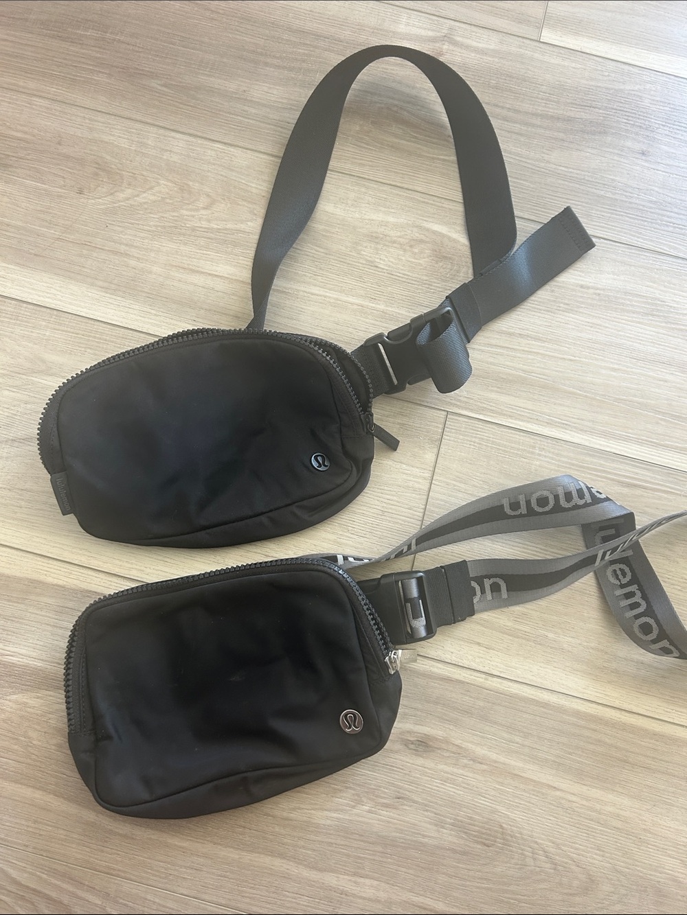 Two lululemon athletica Black Dual Compact Belt Bags